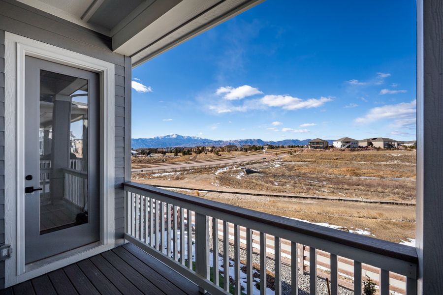 Exterior details and patio area of a home in Revel Crossing at Wolf Ranch - The Panorama Collection, Colorado Springs (Image 3).