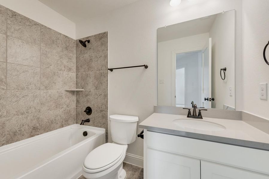 Furnished interior view inside a new home in Dominion of Pleasant Valley, Wylie (Image 28).