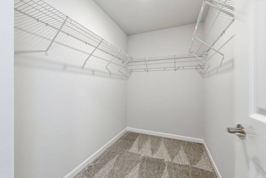 Spacious, unfurnished interior of a new home in Poets Walk, Whitsett (Image 53).