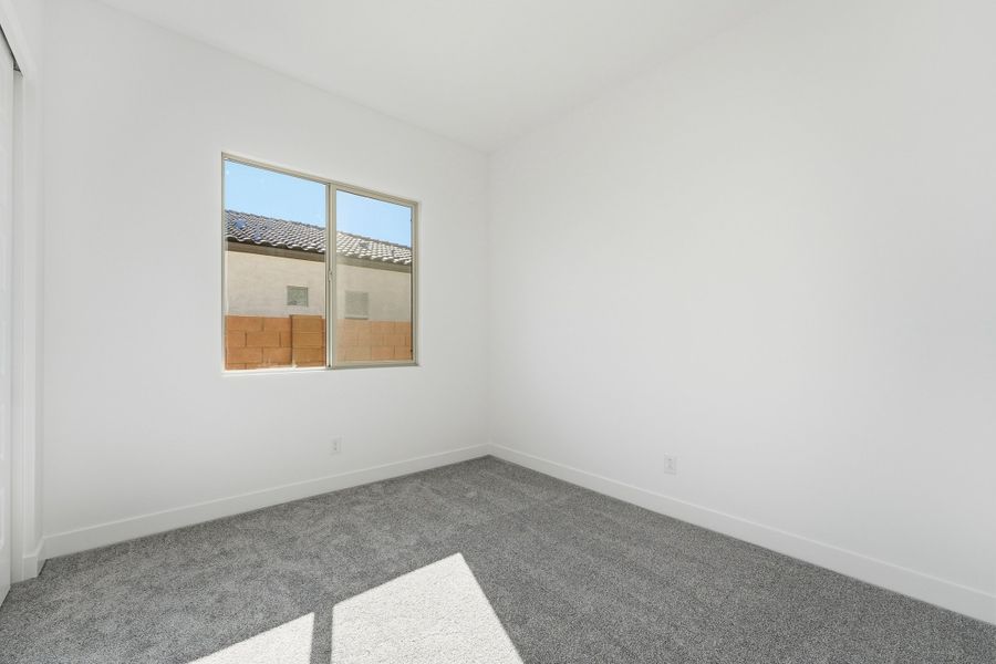 Spacious, unfurnished interior of a new home in Combs Ranch, San Tan Valley (Image 32).