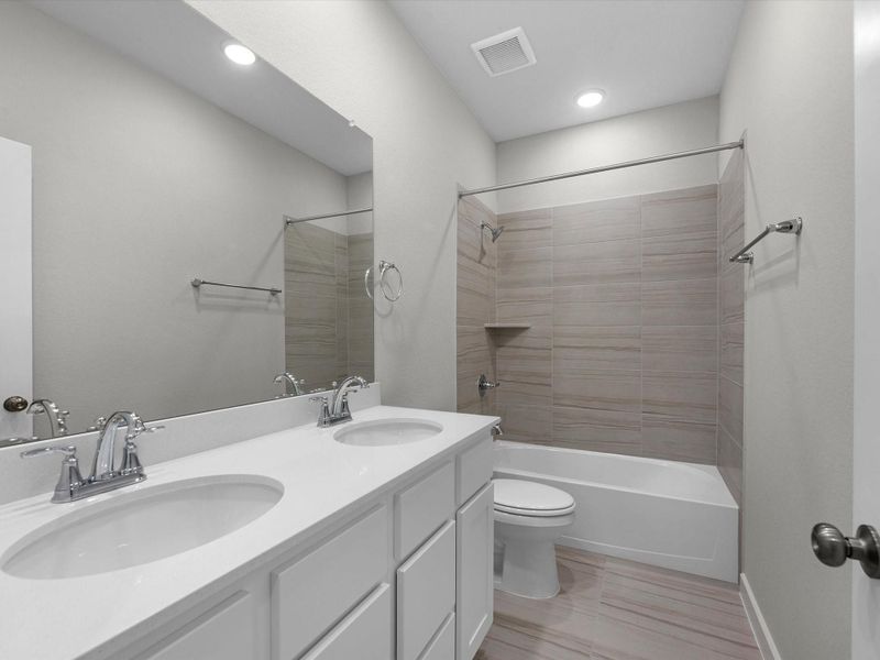 Furnished interior view inside a new home in Mason Woods, Cypress (Image 9).