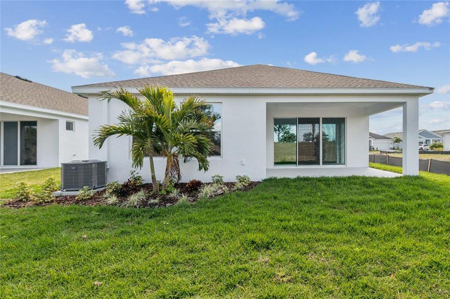 Exterior details and patio area of a home in North River Ranch - Cottage Series, Parrish (Image 3).