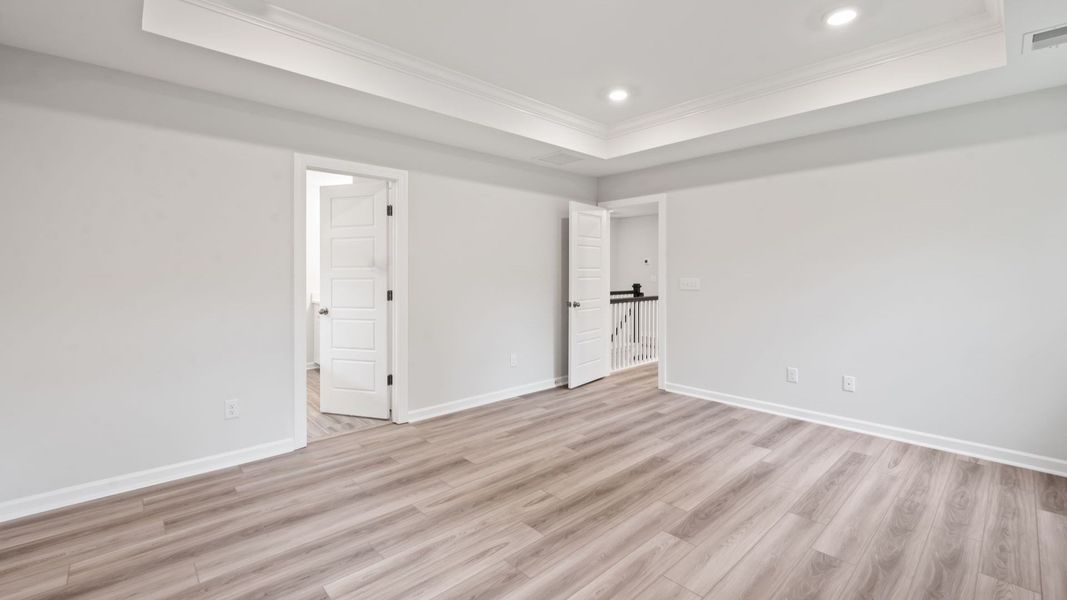 Owners Suite with tray ceiling from Seewee Run. Owners Suite with tray ceiling from Seewee Run.