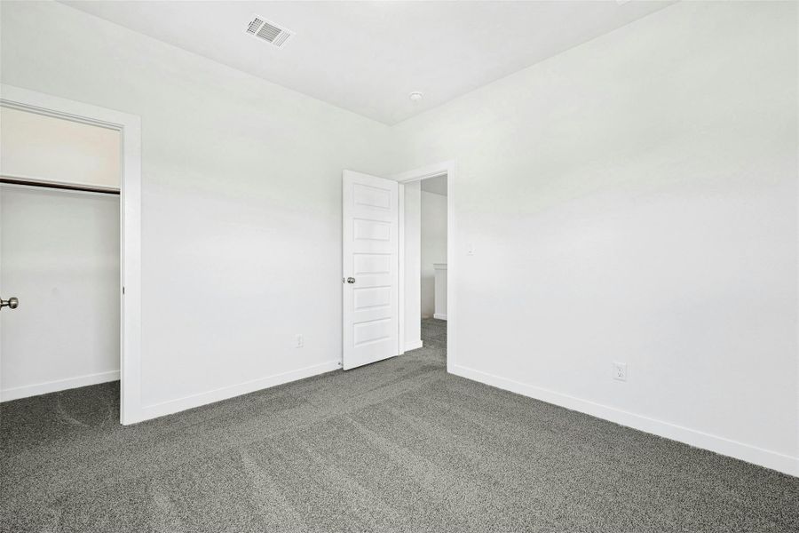Spacious, unfurnished interior of a new home in The Colony, Bastrop (Image 12). Spacious, unfurnished interior of a new home in The Colony, Bastrop (Image 12).