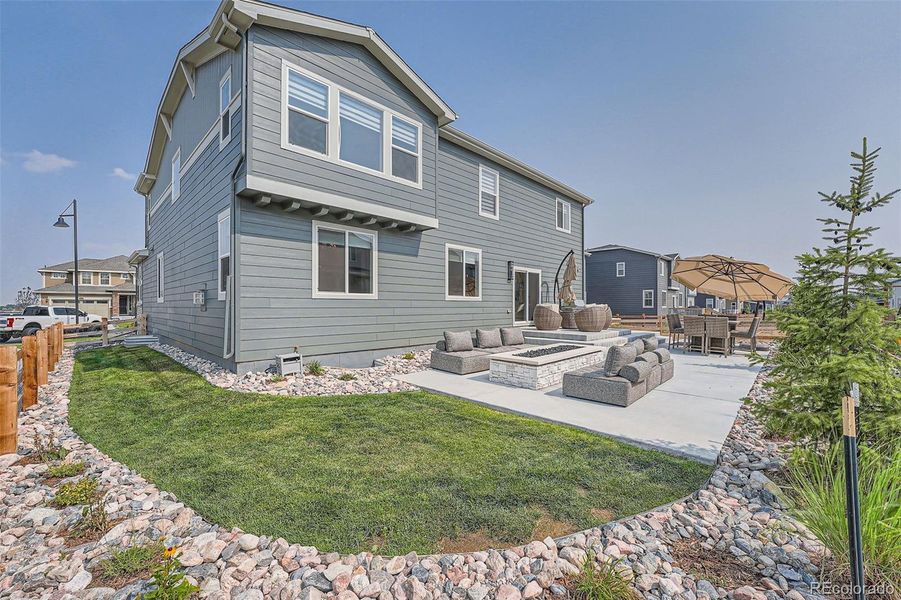 Front exterior of a new home in Morgan Hill, Erie, CO, highlighting curb appeal (Image 20).