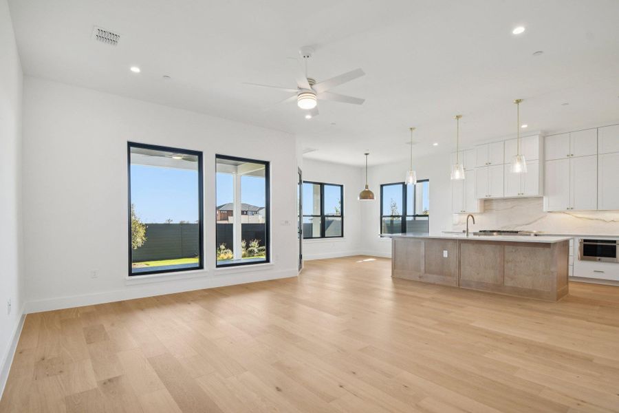 Spacious, unfurnished interior of a new home in Milky Way at River Place, Austin (Image 31).