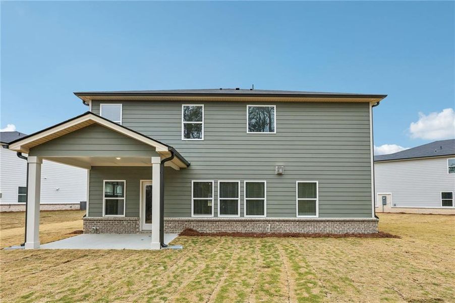 Exterior details and patio area of a home in Parkside at Grayson, Grayson (Image 4).