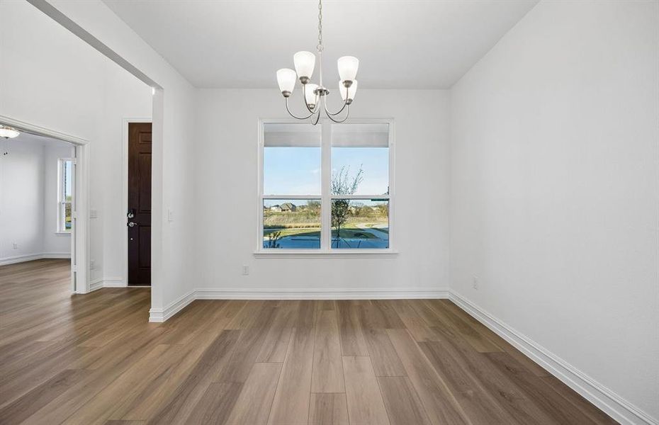 Formal dining area off entry into home Formal dining area off entry into home