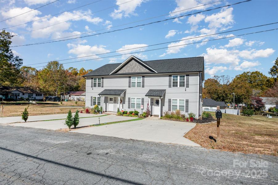 Front exterior of a new home in , Kannapolis, NC, highlighting curb appeal (Image 18).