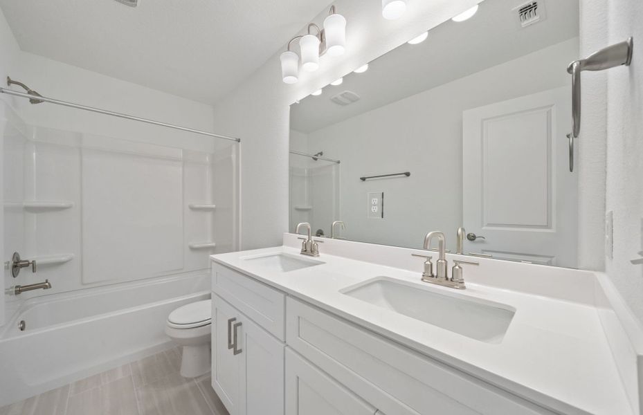 Furnished interior view inside a new home in Crosswinds, Kyle (Image 6).