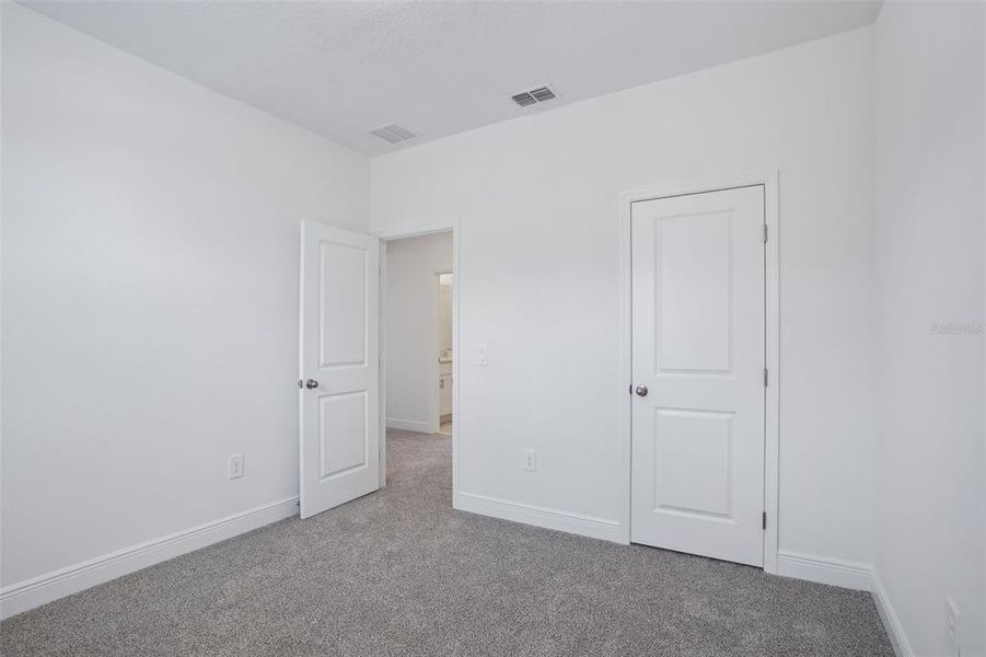 Spacious, unfurnished interior of a new home in Cyrene at Minneola - Villas, Montverde (Image 24). Spacious, unfurnished interior of a new home in Cyrene at Minneola - Villas, Montverde (Image 24).