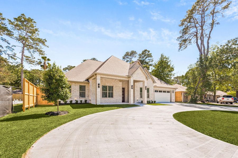 Front exterior of a new home in , Houston, TX, highlighting curb appeal (Image 25).