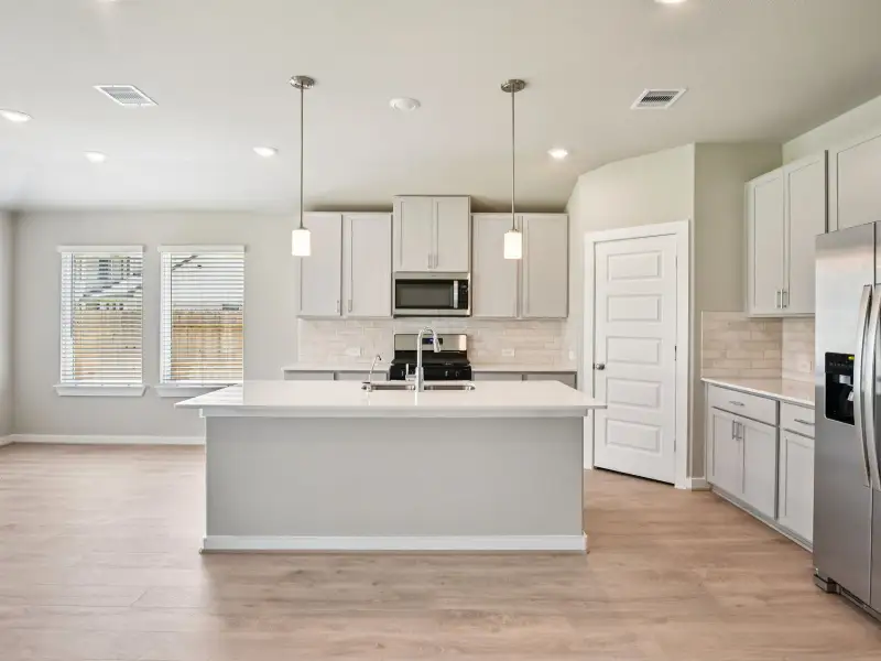 Furnished interior view inside a new home in Stewart's Ranch, Conroe (Image 4).