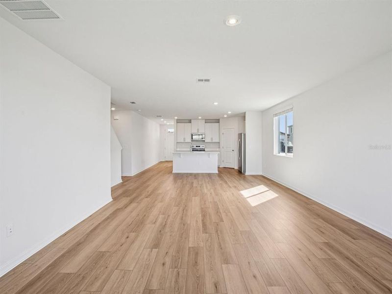 Spacious, unfurnished interior of a new home in The Grove at Stuart Crossing - Classic Series, Bartow (Image 22).