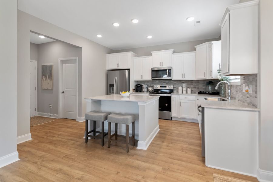 Representative furnished interior of a home built from the Nelson by McKee Homes in Coventry Woods, Fayetteville (Image 3).
