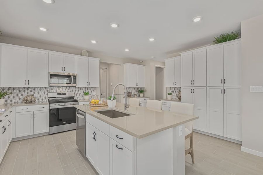 Representative furnished interior of a home built from the 1901 by Elliott Homes in Camilo at Santana, Yuma (Image 13).