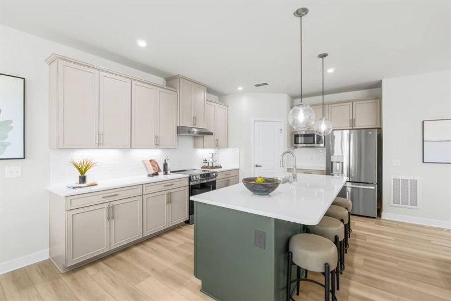 Representative furnished interior of a home built from the Charles by Ryan Homes in East Lake, Leland (Image 8). Representative furnished interior of a home built from the Charles by Ryan Homes in East Lake, Leland (Image 8).