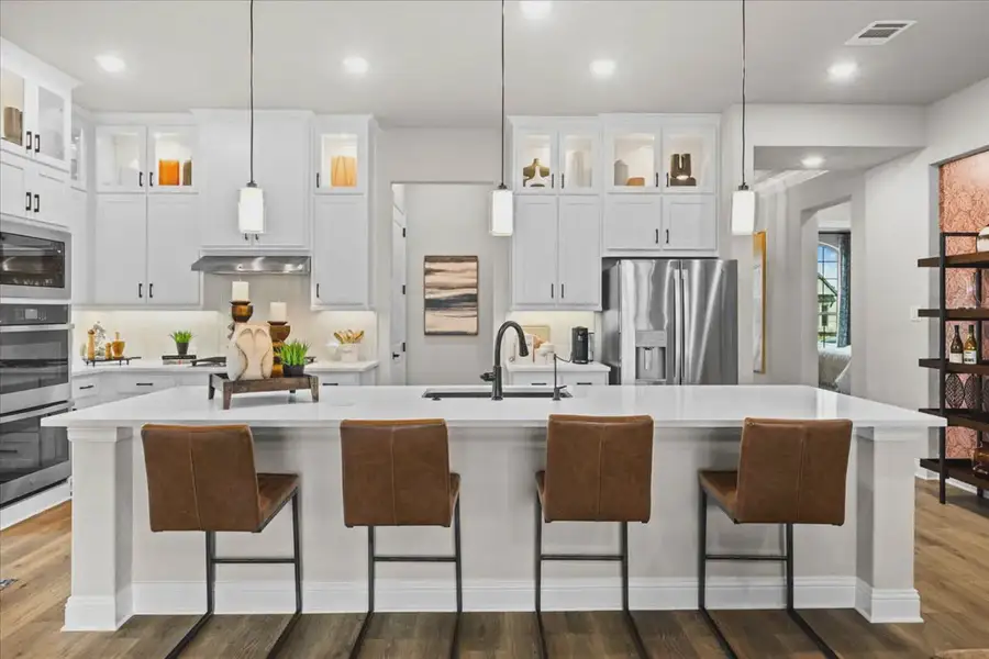 Representative furnished interior of a home built from the Brookville by Chesmar Homes in Canyon Falls, Argyle (Image 4).