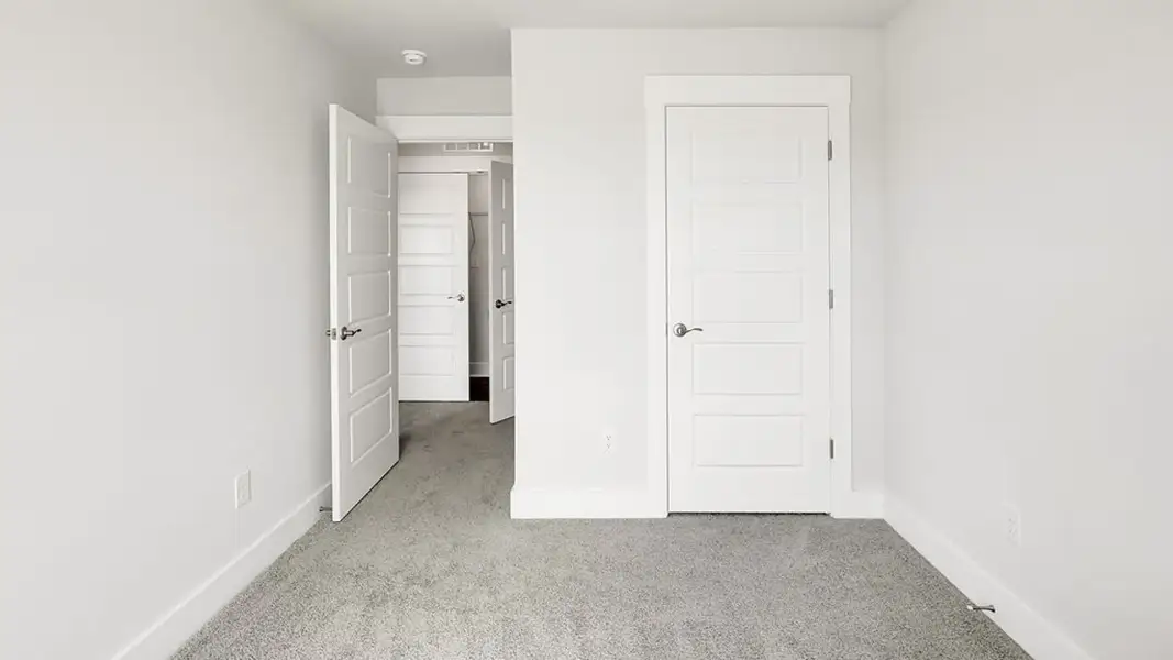 Spacious, unfurnished interior of a new home in The Cove at Indigo Preserve Townhomes, Leland (Image 17).