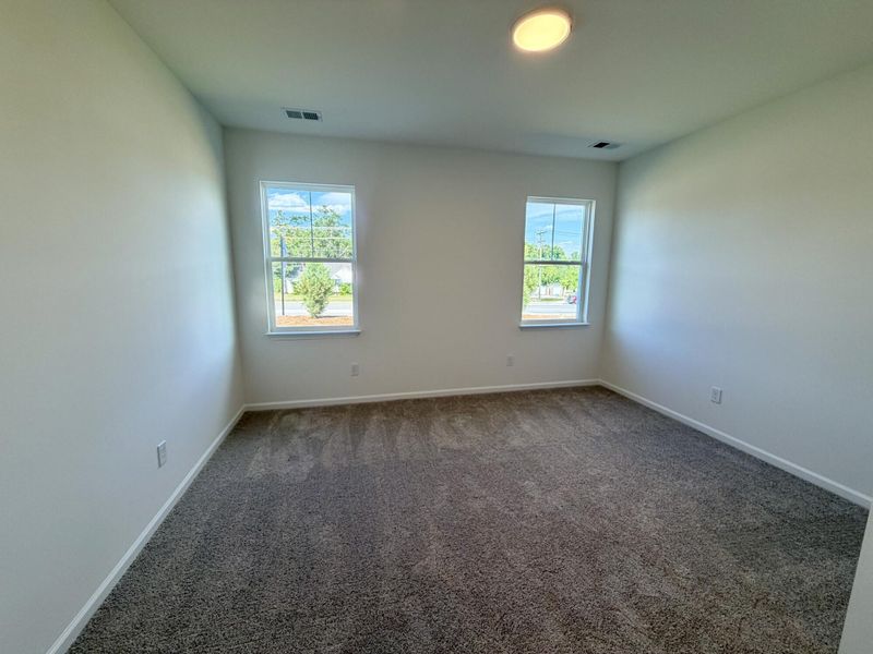 Spacious, unfurnished interior of a new home in Bellevue Townhomes, Greenville (Image 16).