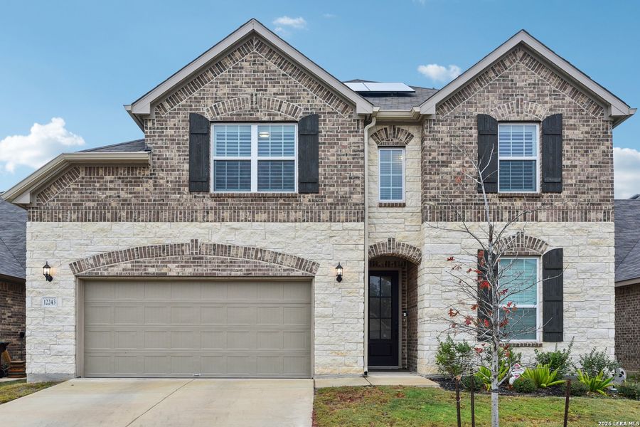 Front exterior of a new home in Davis Ranch, San Antonio, TX, highlighting curb appeal (Image 22).