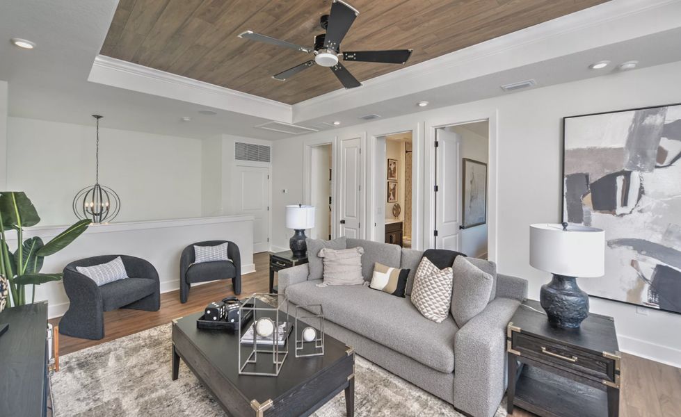 Furnished interior in a model home at Laureate Park in Orlando (Image 25).