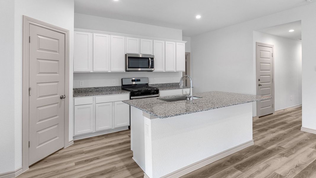 Furnished interior view inside a new home in Reserve at Mallard Lakes, Orange (Image 3).
