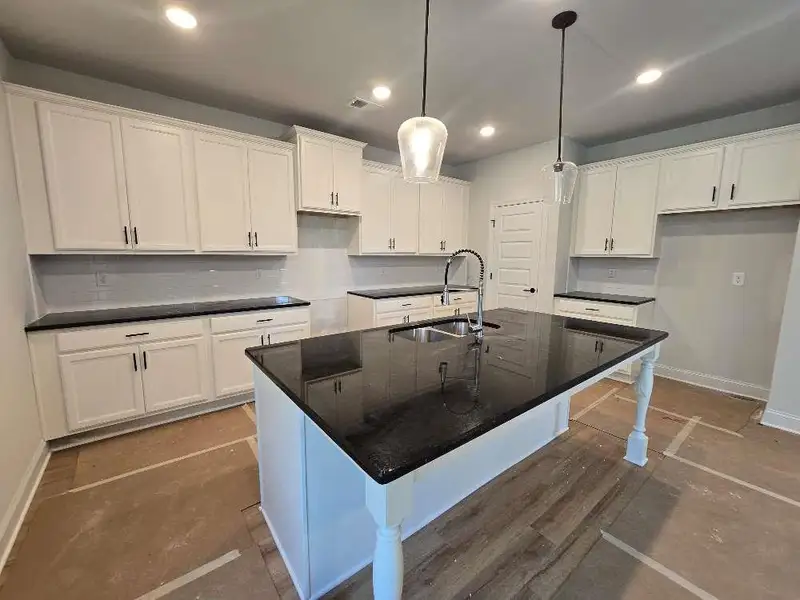 Furnished interior view inside a new home in Waters Edge, Mansfield (Image 3).