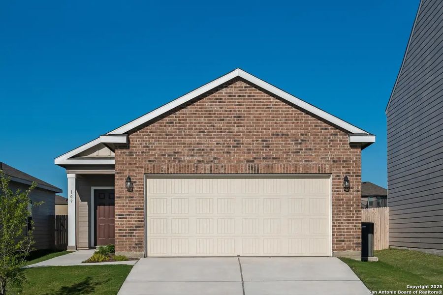 Front exterior of a new home in Saddlebrook Ranch, Schertz, TX, highlighting curb appeal (Image 11).