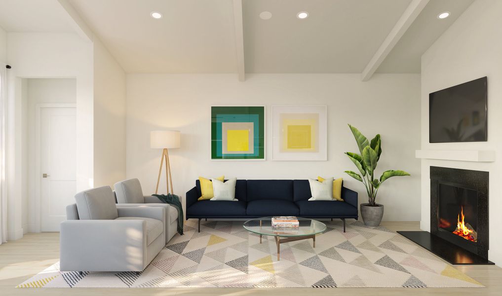 Great room with vaulted ceiling and white-stained ceiling beams