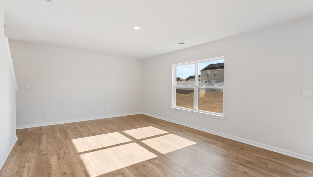 Spacious, unfurnished interior of a new home in Magnolia at the Bluffs Phase 3, Freeport (Image 20).