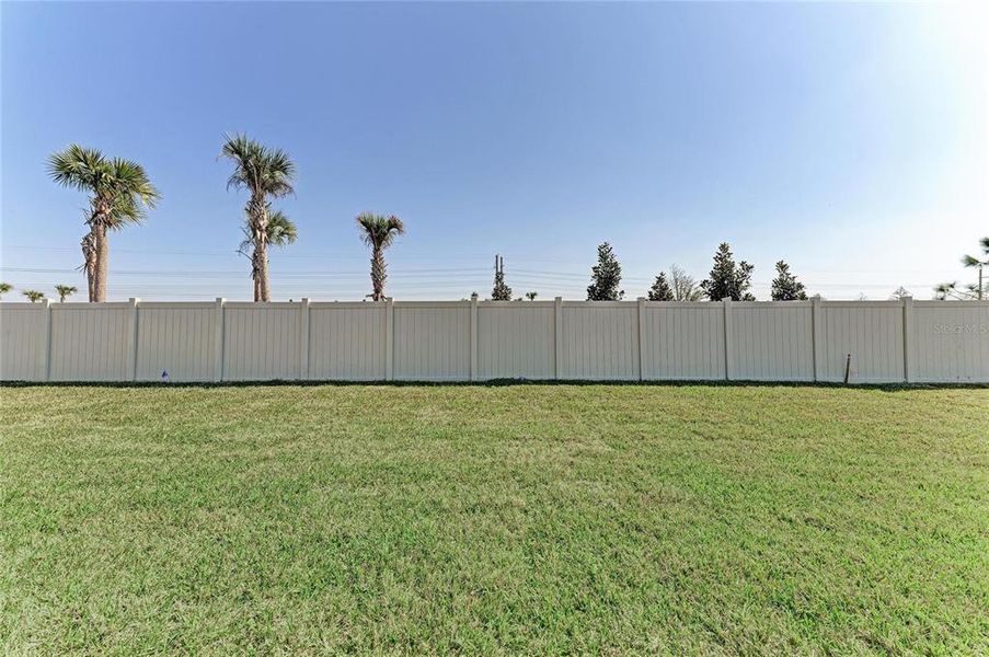 Exterior details and patio area of a home in Oakfield, Parrish (Image 3).