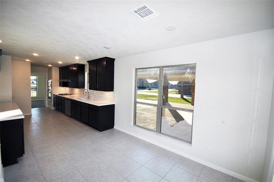 Large Breakfast room with abundant natural lighting.