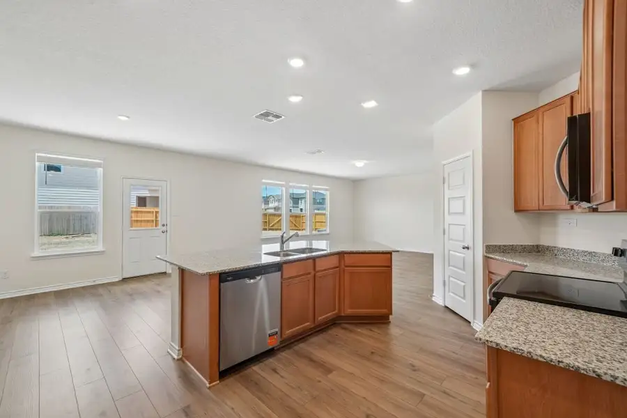 Furnished interior view inside a new home in Preserve at Culebra - Sterling Collection, San Antonio (Image 10).