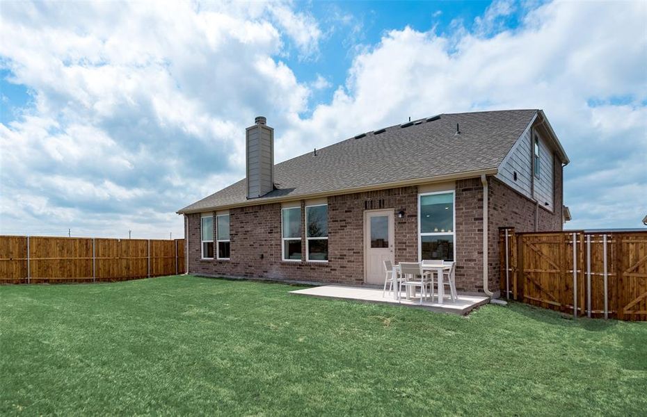 Exterior details and patio area of a home in Elizabeth Creek, Haslet (Image 3). Exterior details and patio area of a home in Elizabeth Creek, Haslet (Image 3).