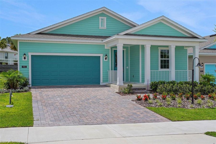 Front exterior of a new home in Green Key Village, Lady Lake, FL, highlighting curb appeal (Image 1). Front exterior of a new home in Green Key Village, Lady Lake, FL, highlighting curb appeal (Image 1).