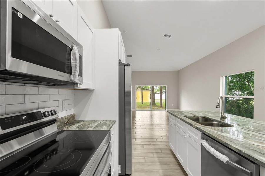 Furnished interior view inside a new home in , Lake Alfred (Image 6).
