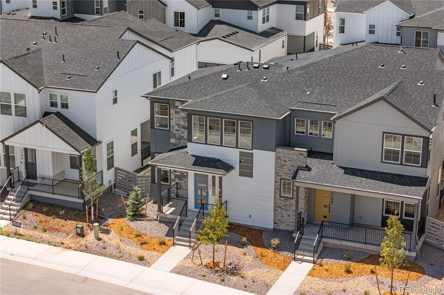 Front exterior of a new home in Duet at Sterling Ranch, Littleton, CO, highlighting curb appeal (Image 18).