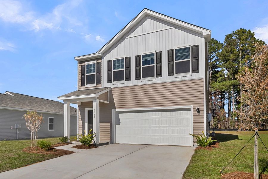 Representative exterior photo of a completed home built from the Voyager by Starlight Homes in Watson Hill, Summerville, SC (Image 24).