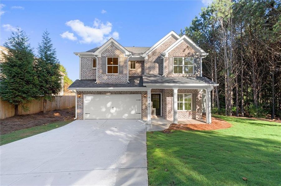 Front exterior of a new home in , Douglasville, GA, highlighting curb appeal (Image 25). Front exterior of a new home in , Douglasville, GA, highlighting curb appeal (Image 25).