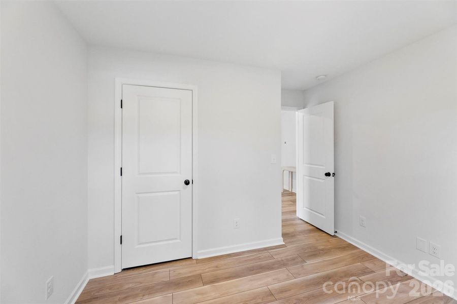 Spacious, unfurnished interior of a new home in Surrey Woods, Charlotte (Image 22).