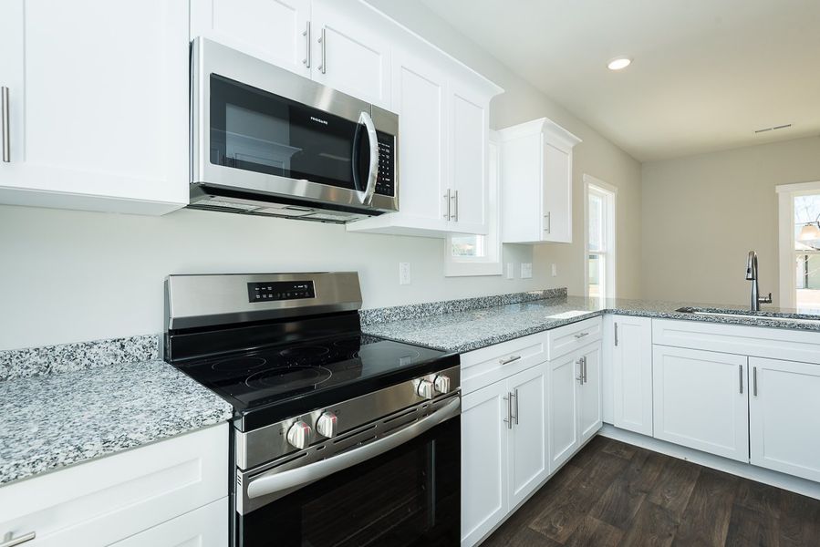 Representative furnished interior of a home built from the Thomas by Foundation Home Builders LLC in Pinnix Loop, Burlington (Image 10).