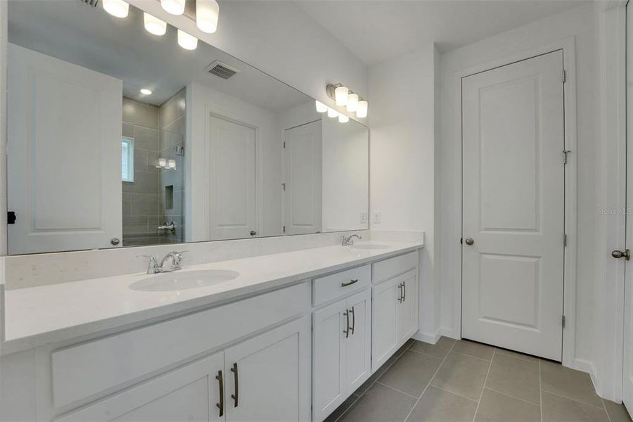 Furnished interior view inside a new home in Serenade at Ovation, Winter Garden (Image 3). Furnished interior view inside a new home in Serenade at Ovation, Winter Garden (Image 3).