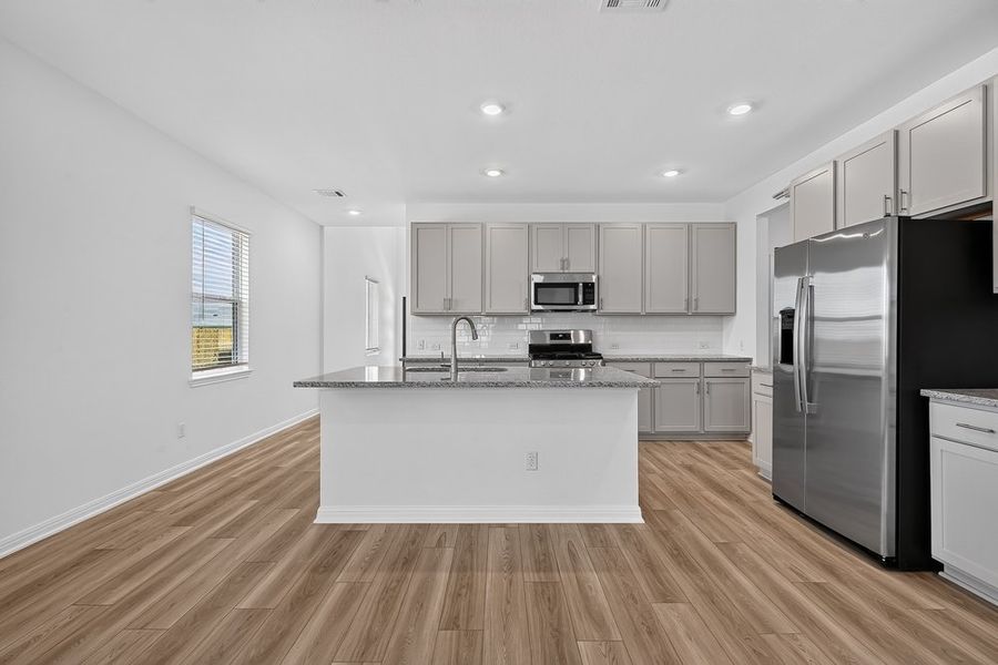 Furnished interior view inside a new home in Sunfield, Buda (Image 9).