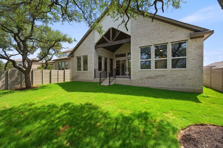 Exterior details and patio area of a home in Wolf Ranch, Georgetown (Image 26).
