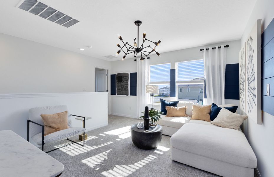 Representative furnished interior of a home built from the Jasmine by Pulte Homes in Tohoqua, Kissimmee (Image 9).