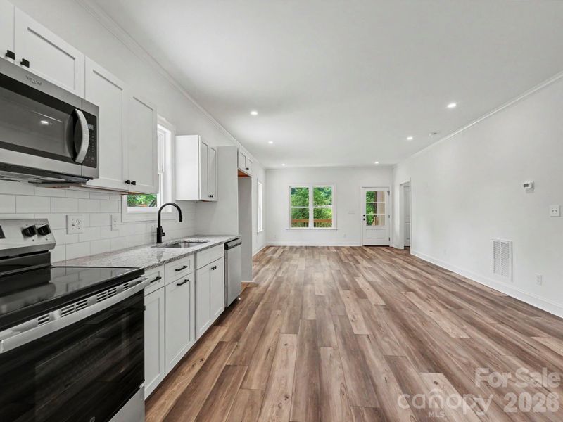Furnished interior view inside a new home in , Mooresville (Image 8).