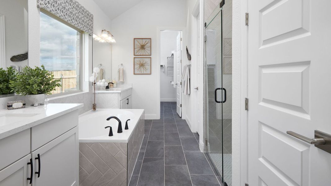 Representative furnished interior of a home built from the Mahogany by Brightland Homes in Sunterra, Katy (Image 9).