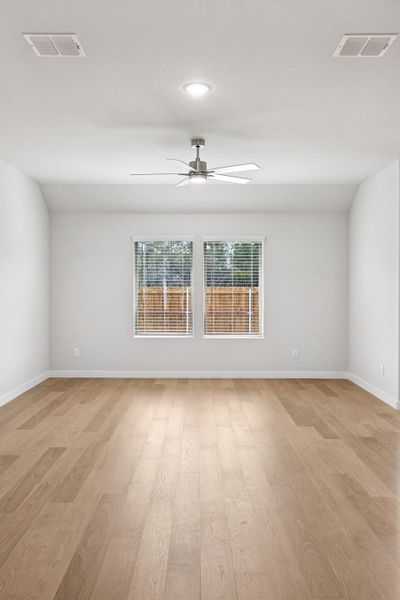 Living Room in the Heisman home plan by Trophy Signature Homes – REPRESENTATIVE PHOTO