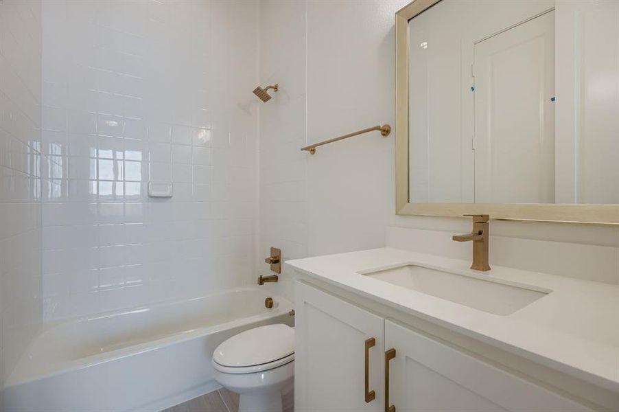 Bathroom with tub / shower combination and vanity Bathroom with tub / shower combination and vanity